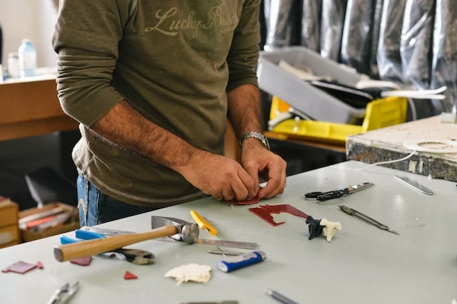 A man working in a workbench
